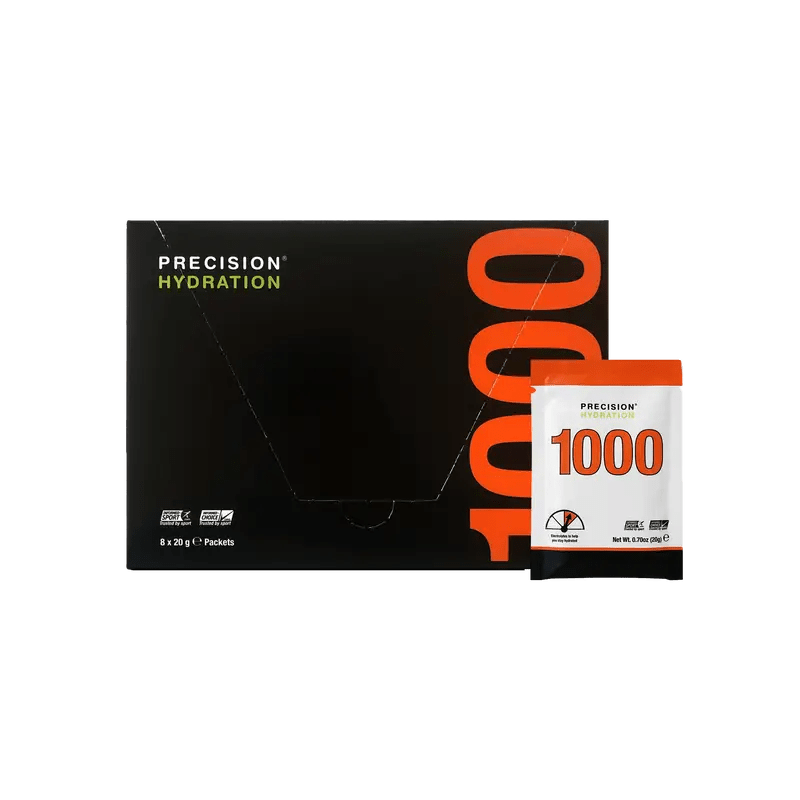Precision Fuel & Hydration electrolyte and carbohydrate drink mix in a colorful powder packet, designed for hydration and energy.
