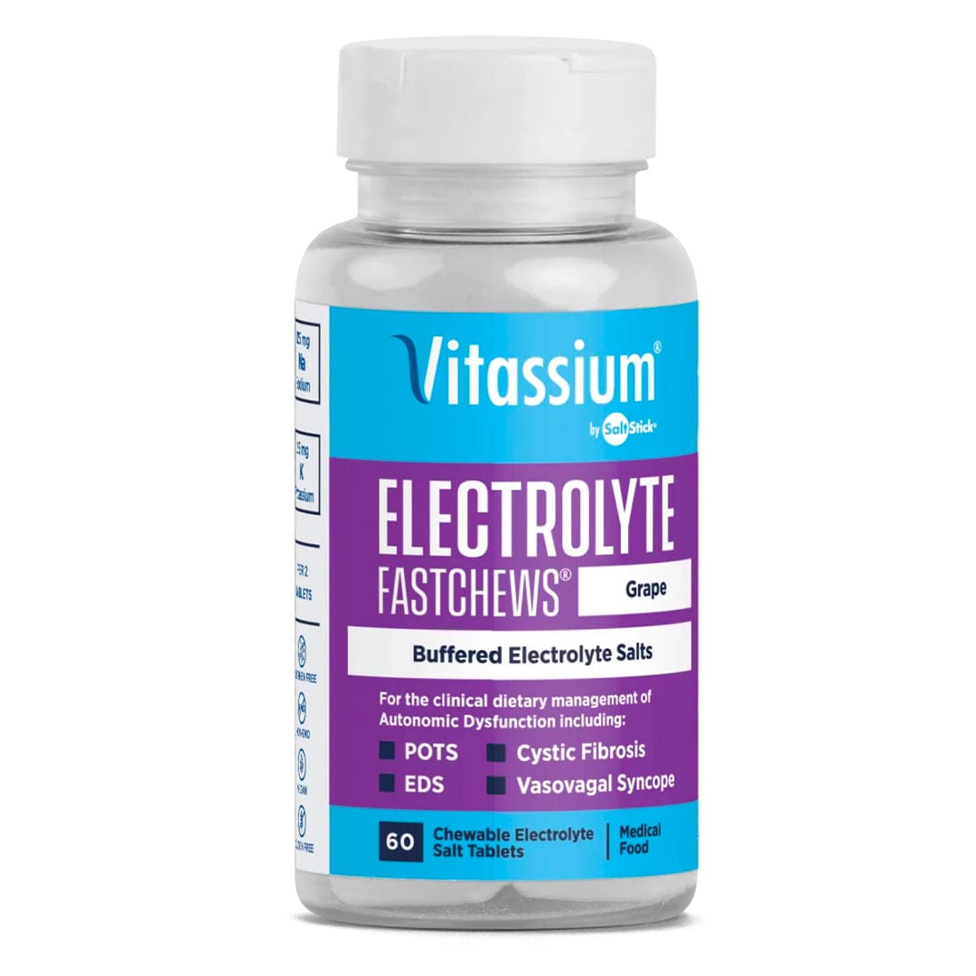 SaltStick Vitassium FastChews in Fruit Punch flavor, showing colorful chewable electrolyte tablets in a clear container.