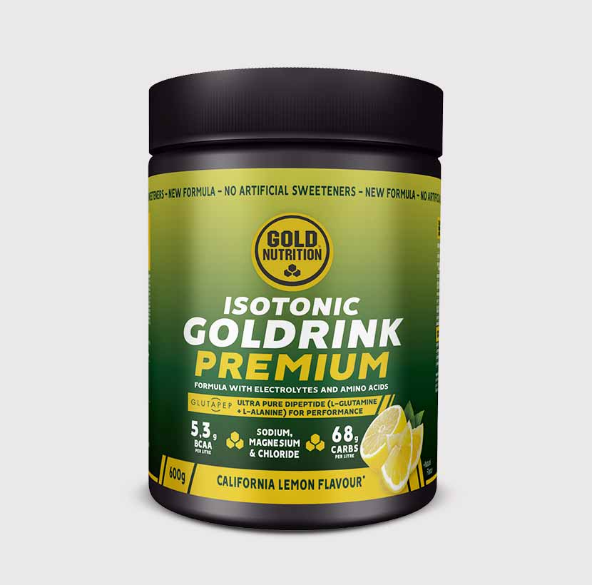 GOLDRINK PREMIUM vitamins and supplements by GoldNutrition, featuring colorful powder in a glass alongside supplement tablets.