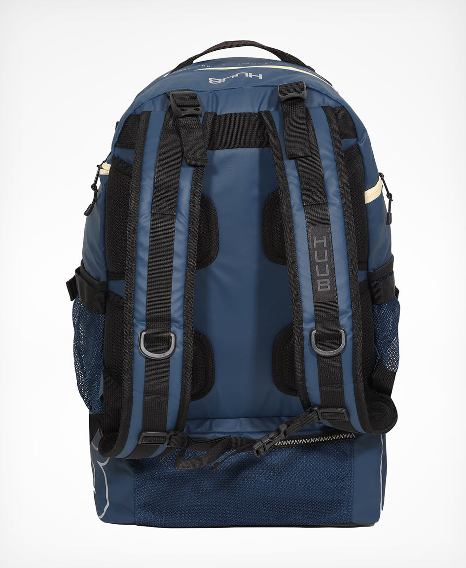 HUUB TT Bag – Transition Three, 40L rucksack, wet/dry, hidden helmet cradle, navy and olive/orange.